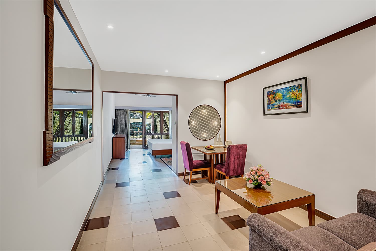 Junior Suite living and dining area leading to the bedroom at Fariyas Resort Lonavala