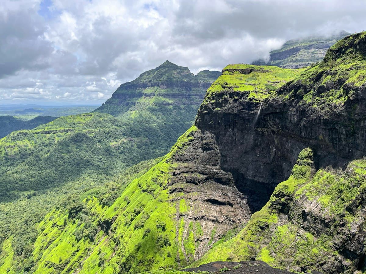 Green valley with a waterfall in the Sahyadri hills of Maharashtra