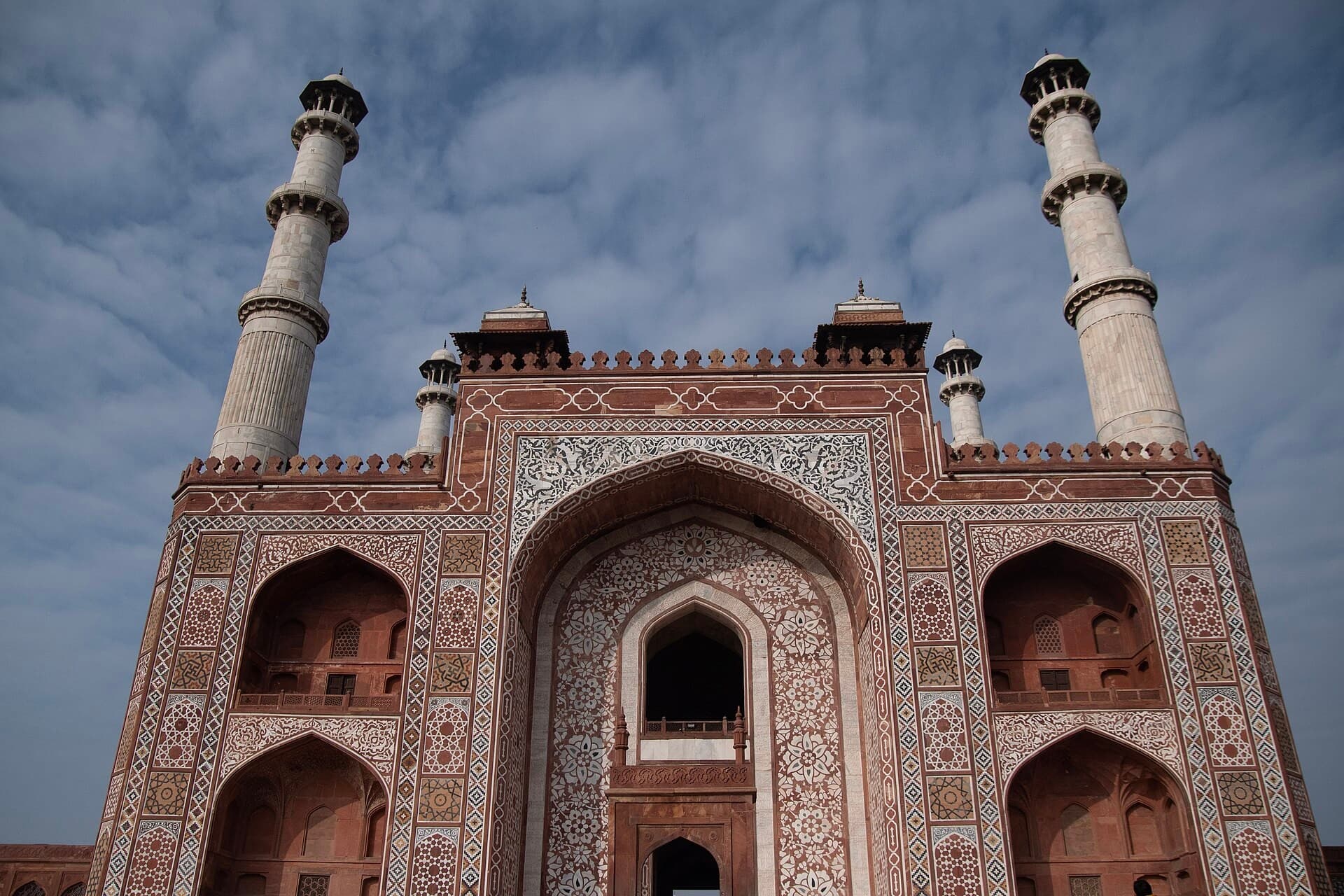 The sandstone and marble gateway to Akbar's tomb at Sikandra with four marble minarets